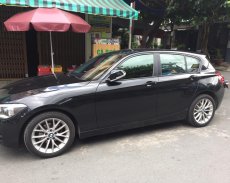Bán em BMW 116i đời 2013 màu đen, số tự động, 8 cấp giá 685 triệu tại Tp.HCM