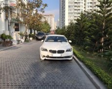 Bán BMW 5 Series 520i sản xuất 2012, màu trắng, nội thất màu kem giá 1 tỷ 150 tr tại Hà Nội